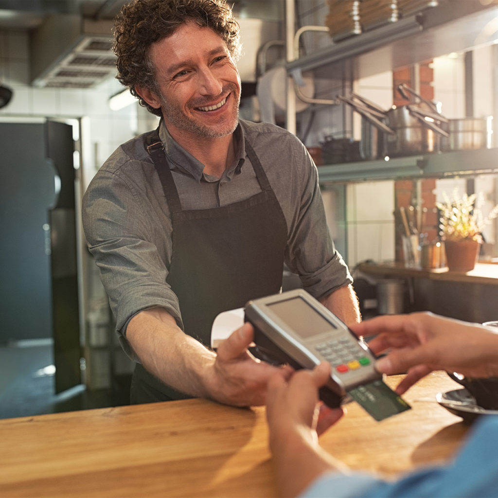 Equip - Customer making payment to barista